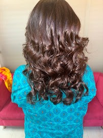 Classic Indian Bride sitting on golden chair